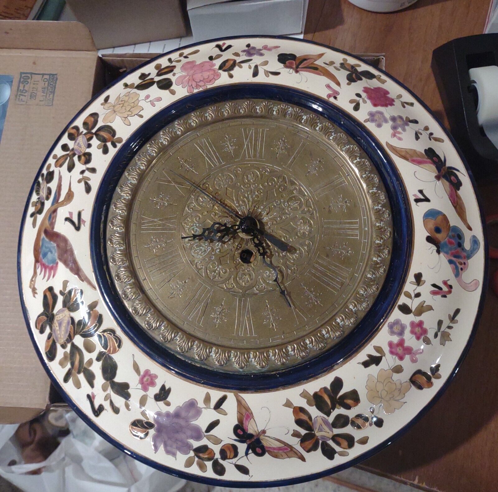 Beautiful majolica plate clock, with copper insert. Mechanical, Arabic numerals.