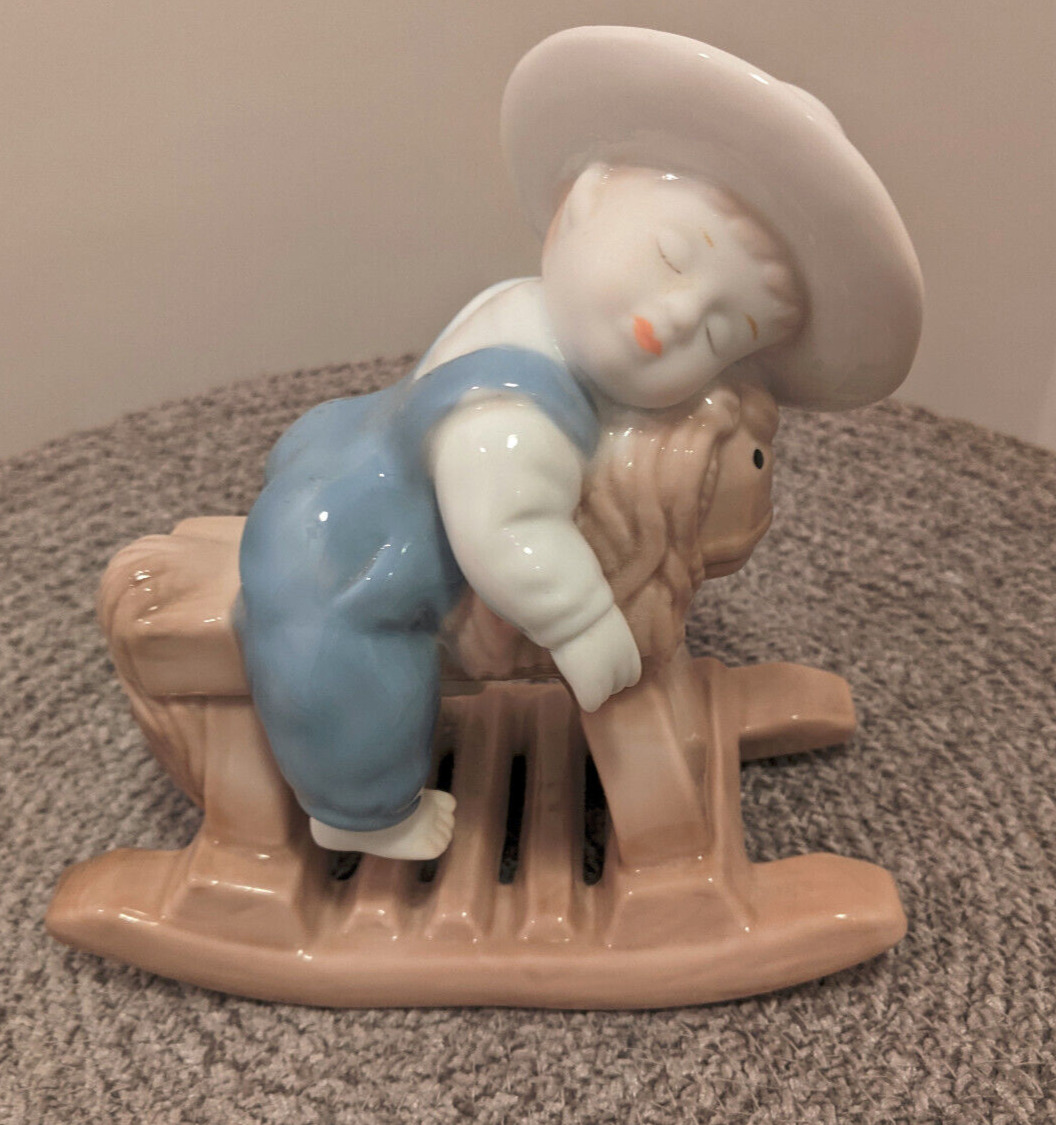 Rock-A- Bye Boy Asleep in the Saddle Rocking Horse  Porcelain Figurine