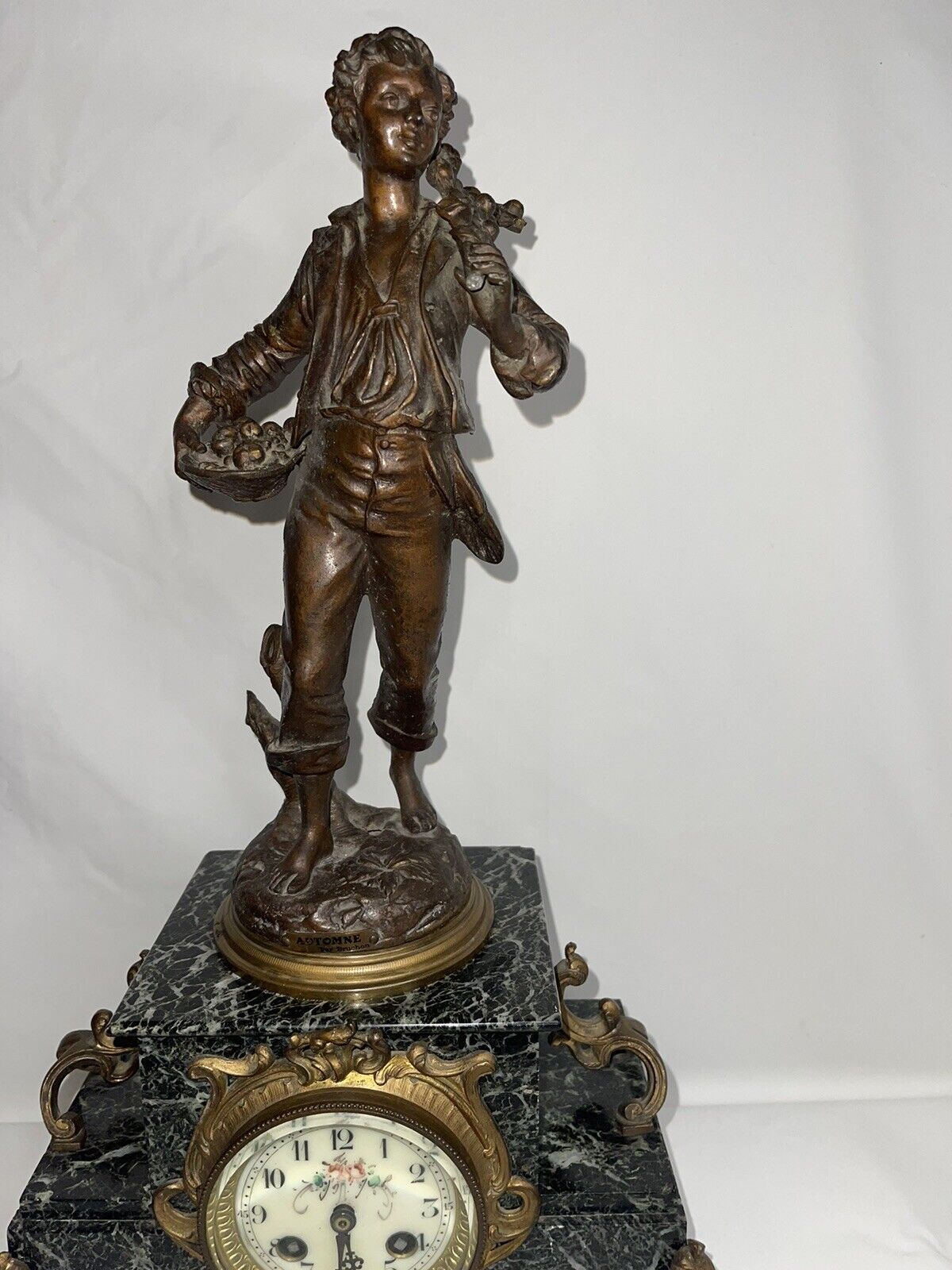Marble table clock with bronze sculpture, late 19th century,