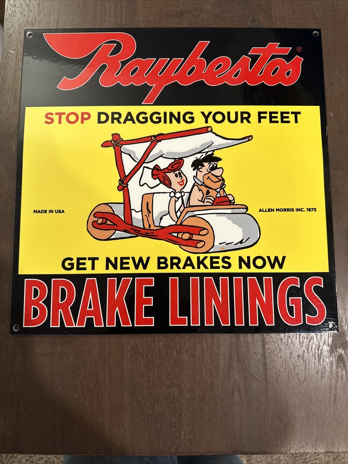 Porcelain Enamel Raybestos Brake Linings Advertising Sign Featuring Flintstones