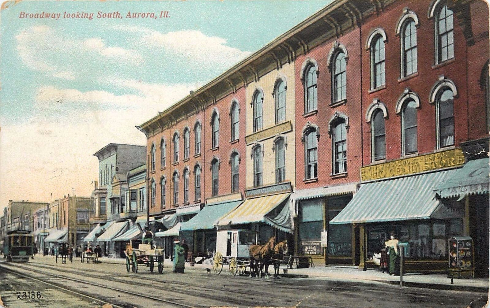 Postcard Aurora Illinois looking South Broadway 5 and 10 cent store horse 1909