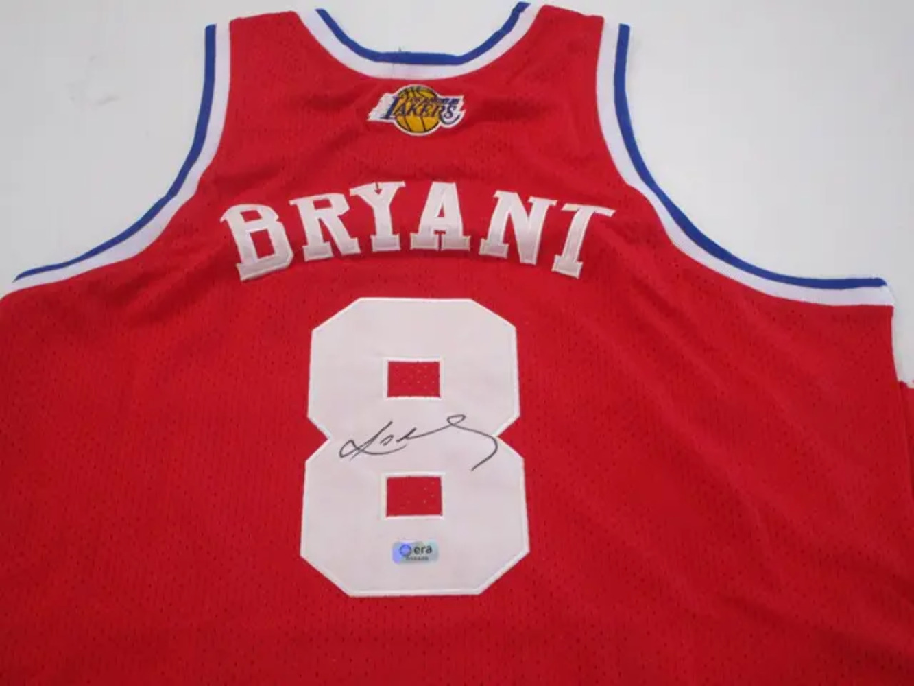 Kobe Bryant of the LA Lakers signed autographed red basketball jersey ERA COA 44