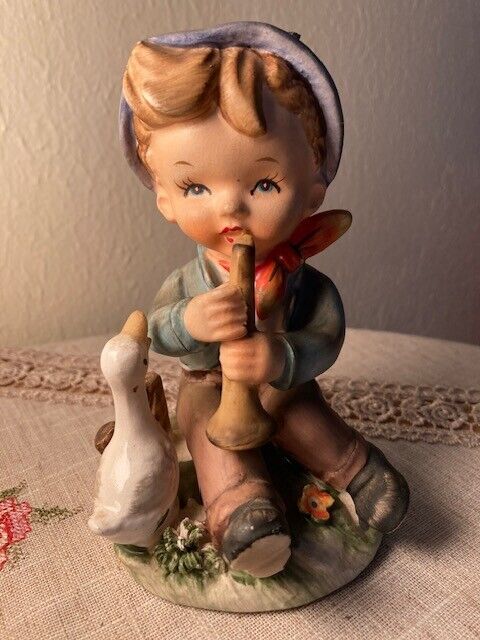 Vintage Porcelain 1950s Hummel Style Boy Playing Horn with a Goose
