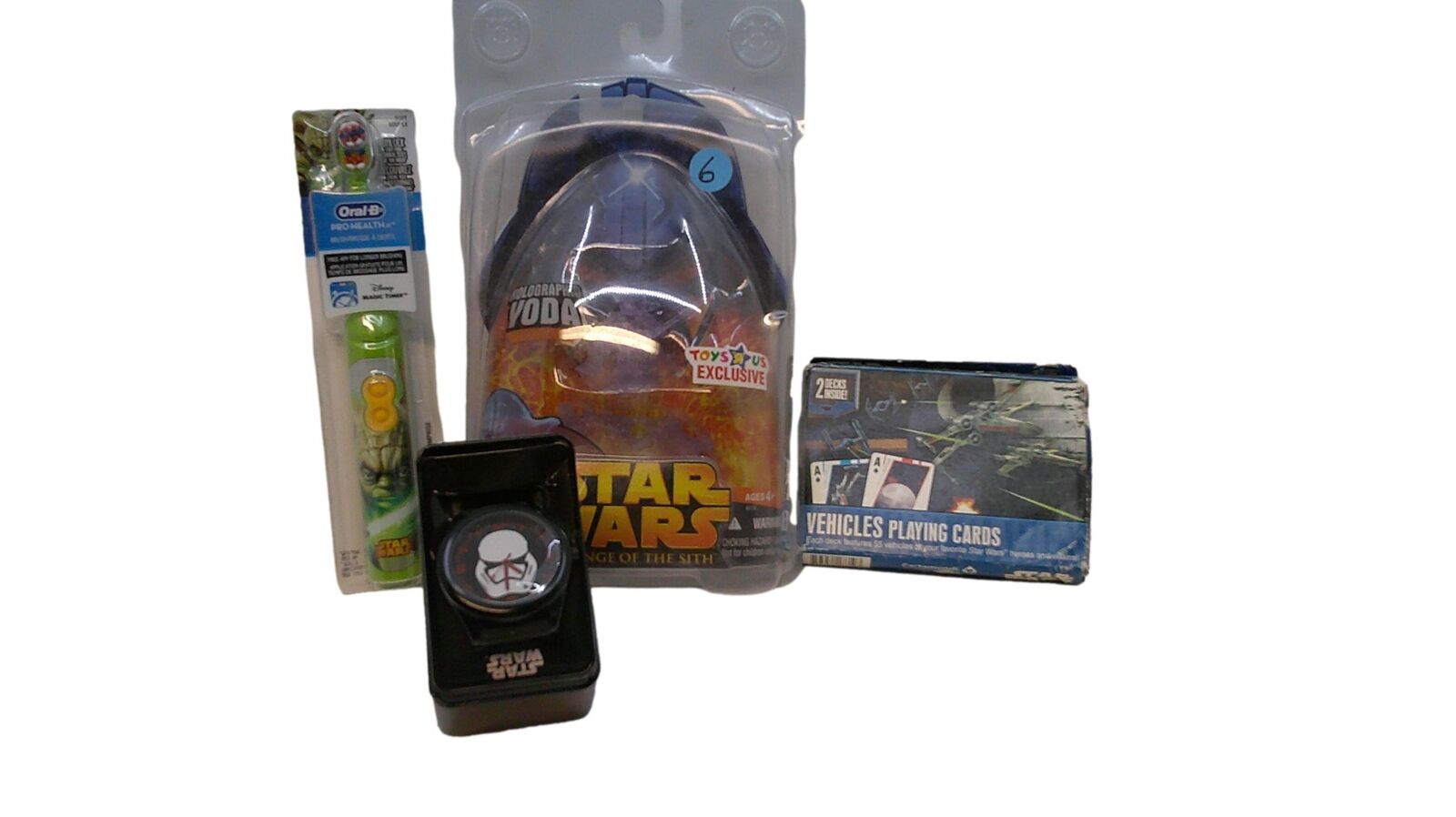 Assortment of Star Wars Items, toothbrush, Watch, Vehicle Playing Cards & Yoda