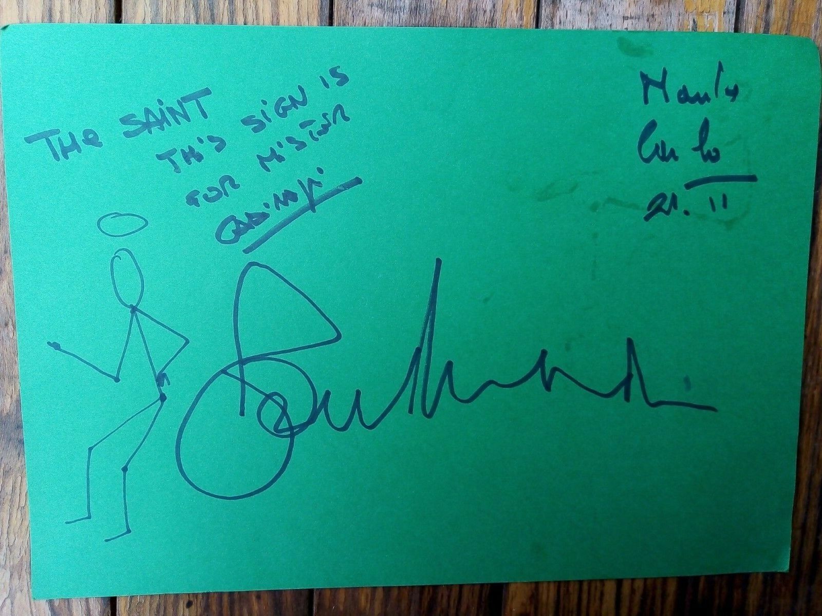 Autographs Roger Moore leaf inscribed with small drawing of The Saint Simon Temp