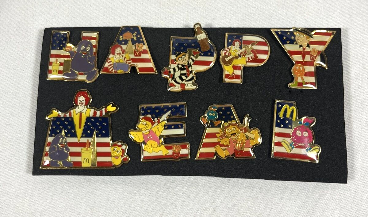 2001 MCDONALD\'S SET OF 9 PINS LETTERS SPELLS HAPPY MEAL WITH CHARACTERS USA FLAG
