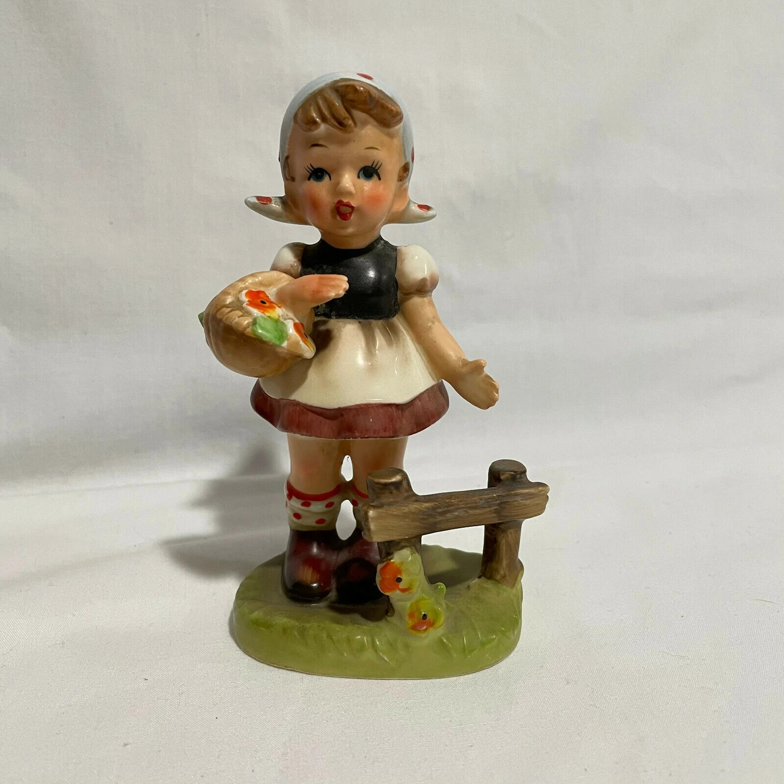 Vintage Norleans Figurine Girl with Basket of Flowers