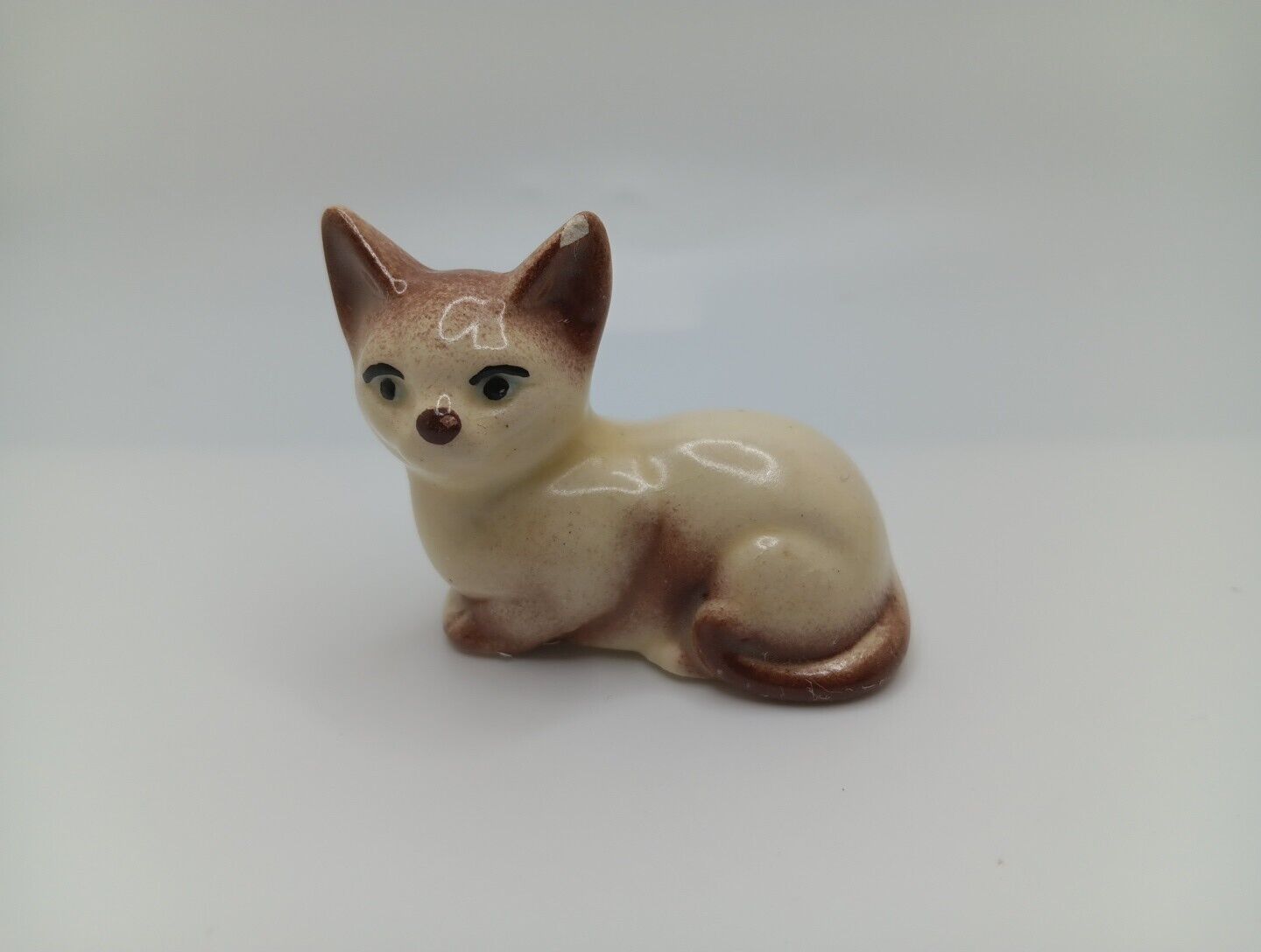 Vintage Siamese Cat Laying Down Mini 2in. Ceramic Figure