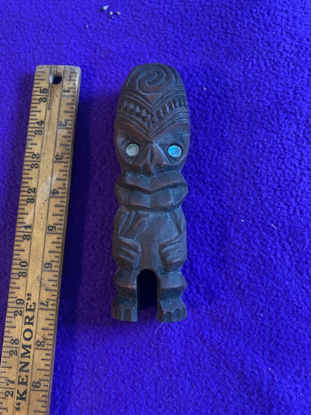 small hand carved figure unknown region of origin