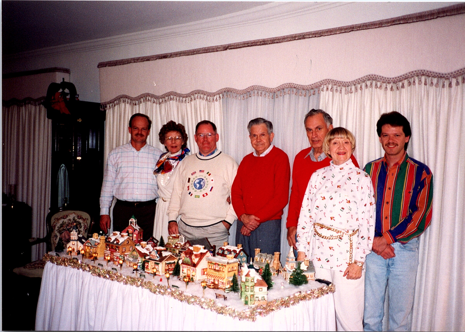 Vintage 1990s Found Photo - Family Poses Together With Pretty Christmas Village