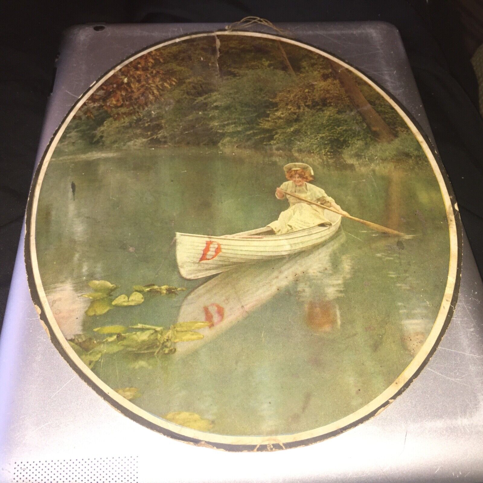 VICTORIAN YOUNG LADY IN A CANOE ROUND CARD