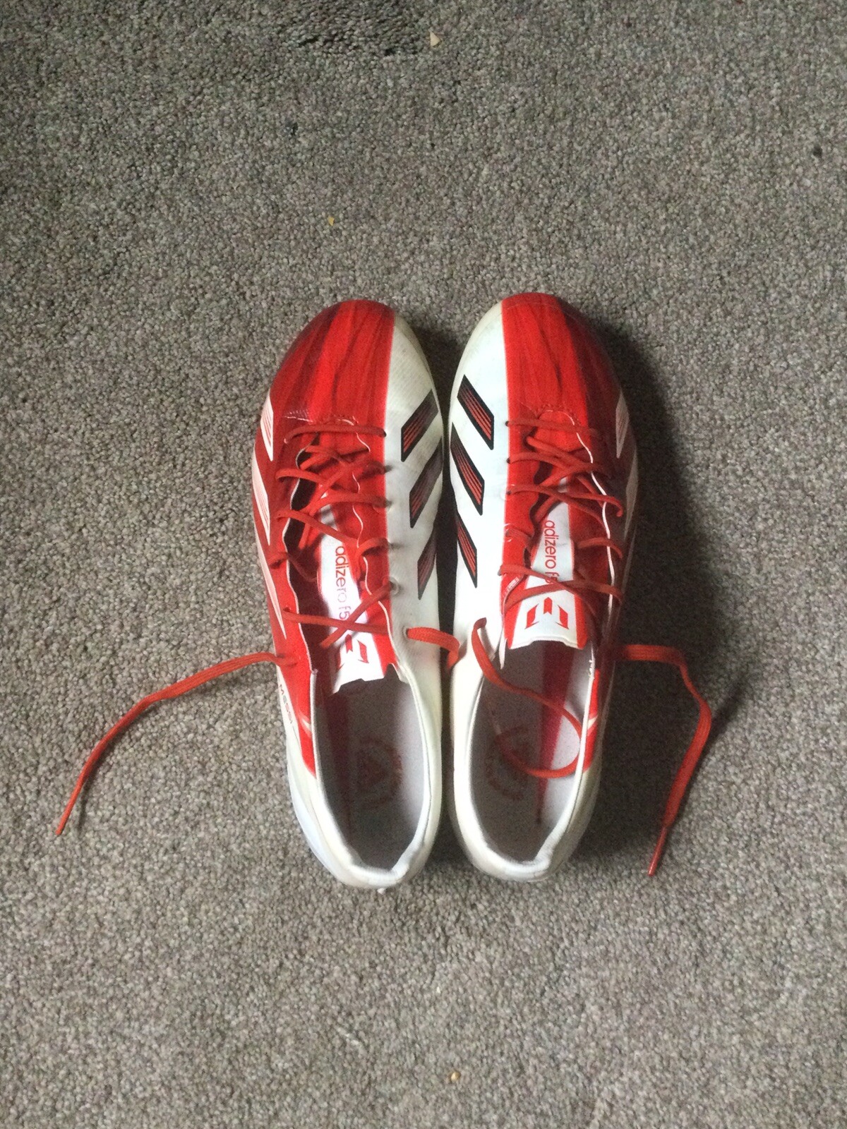 red and white messi boots