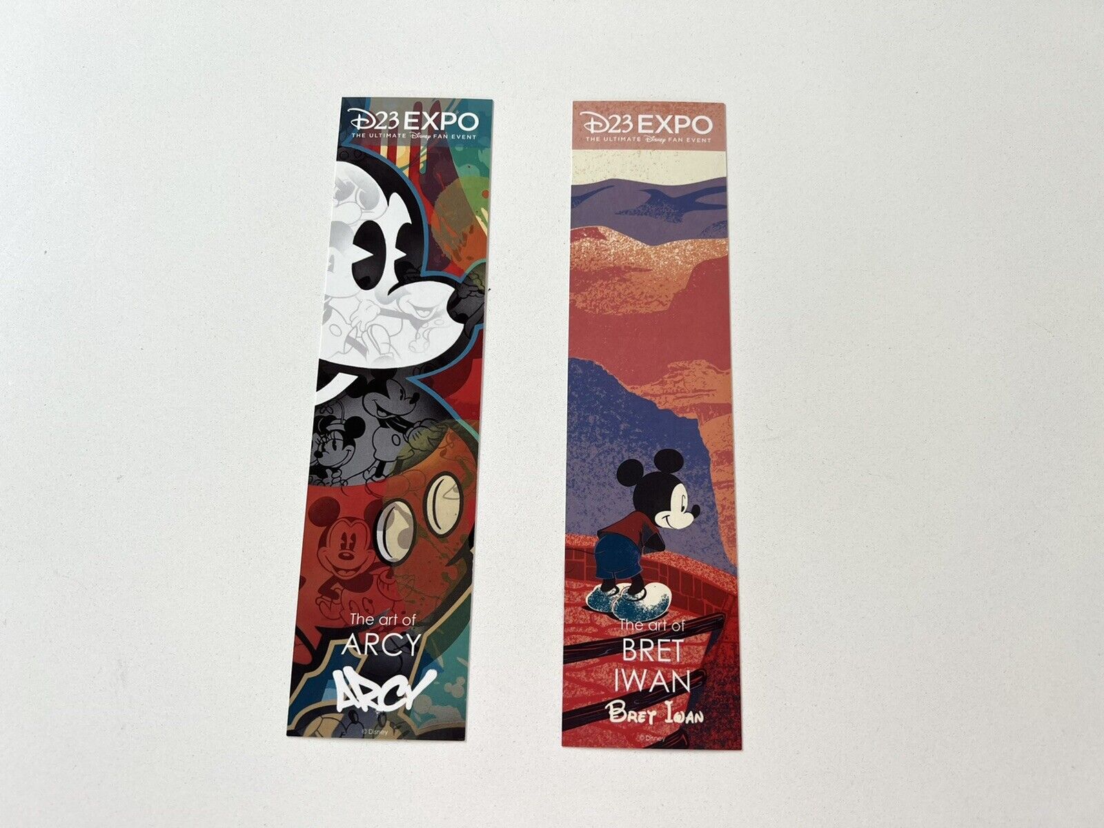D23 Expo exclusive Artist collectors 2 bookmark sized prints: Arcy, Bret Iwan