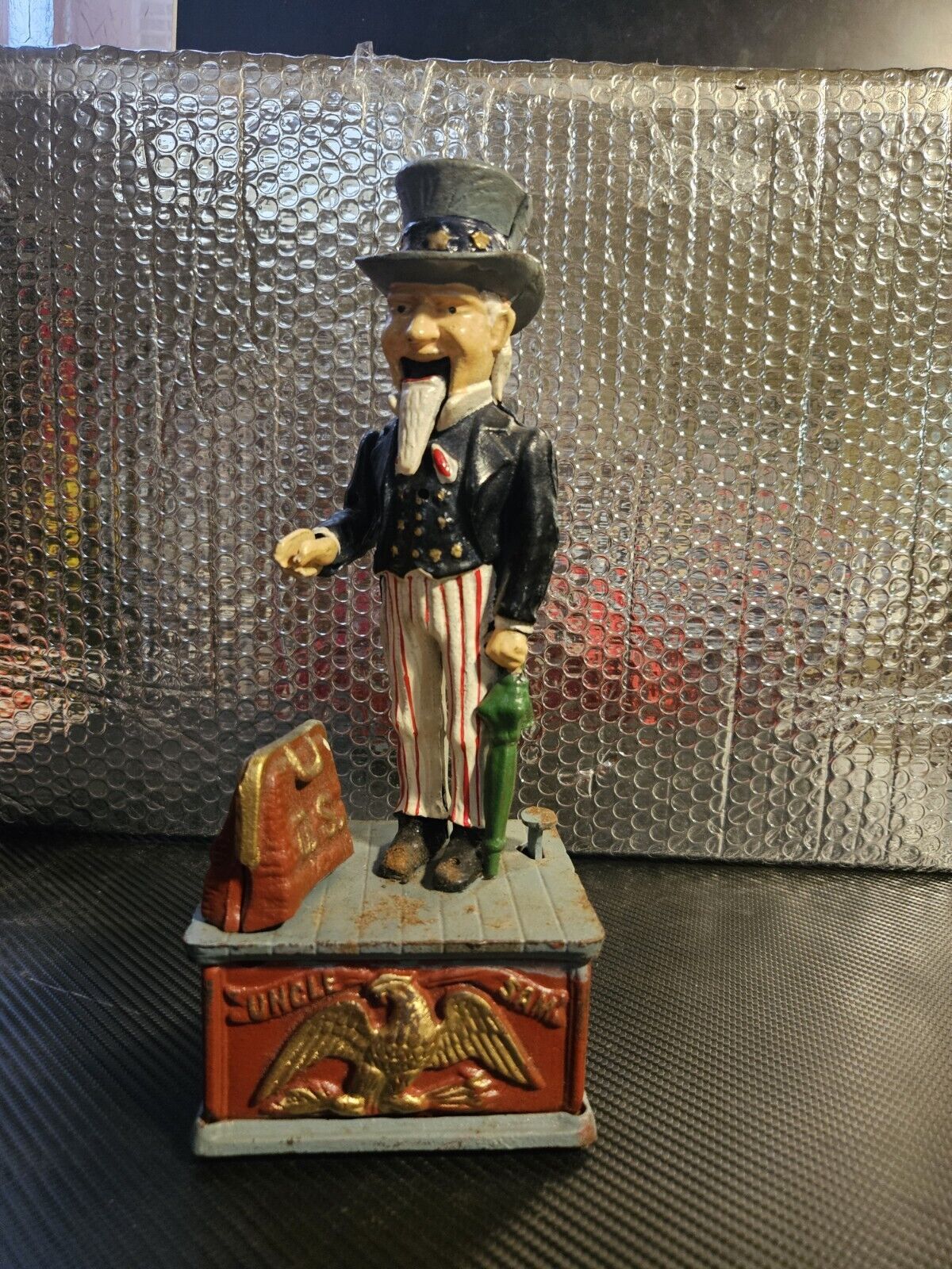 Vintage Uncle Sam Cast Iron Mechanical Coin Bank with the plug Rare 