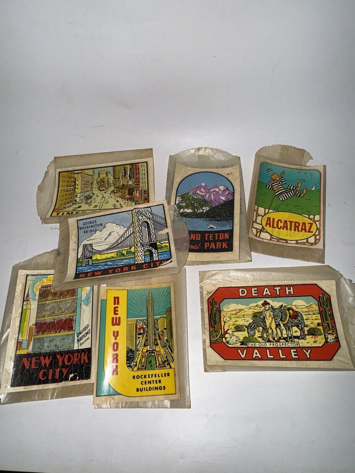 7 Vintage Souvenir Travel Decals, ALCATRAZ, DEATH VALLEY, GRAND TETON, NYC