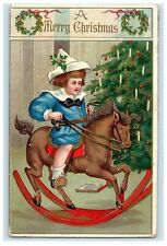 1911 Christmas Holly Children Rocking Horse Embossed Antique Postcard picture