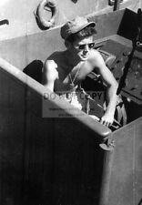 LIEUTENANT JOHN F. KENNEDY ABOARD THE NAVY PT-109 IN 1943 - 8X10 PHOTO (EP-889) picture