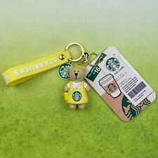 STARBUCKS KEYCHAIN BEAR BARISTA IN YELLOW WITH HAIR PIN UNIQUE LOGO ID HOLDER picture