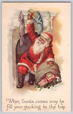 Postcard Christmas Santa Claus Down Chimney Gifts Stocking Gibson Artist Signed picture