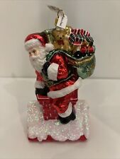 NWT Neiman Marcus 2022  Santa Going Down Chimney Glass Ornament picture