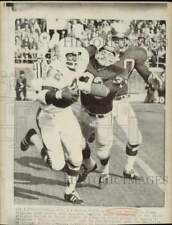 1970 Press Photo Miami Dolphins Back Mercury Morris pushes away from Preece picture