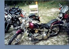 FOUND COLOR PHOTO J_1567 MOTORCYCLES PARKED BY TRAFFIC POST picture