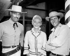 JOHN RUSSELL, PETER BROWN AND PEGGIE CASTLE IN 