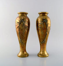 A pair of French art nouveau bronze vases with flowers in relief. Ca. 1890 picture