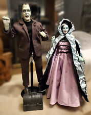 The Ashton-Drake Herman & Lily Munster Poseable Figure set w/accessories picture