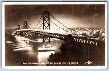 1941 RPPC SAN FRANCISCO CA OAKLAND AND BAY BRIDGE FROM Y. B. ISLAND AT NIGHT picture