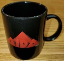 AIDA Disney black coffee mug/cup Elton John & Tim Rice picture