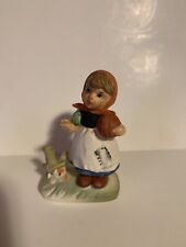 Vintage Enesco Little Girl Holding a Pumpkin/Standing by a Fence picture