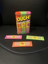 Vintage Ouch Bubble Gum Tin With Wrappers Amurol Pink Band-Aid picture