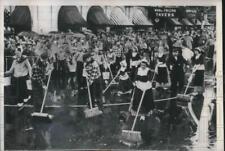 1949 Press Photo Bolland,Mich Citizens sweep streets foir tulip festival picture