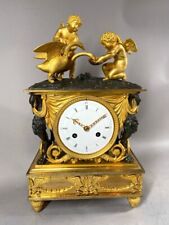 Gilded Elegance: French Empire Mantel Chimney Clock, circa 1810 picture