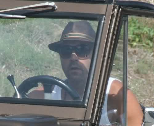 Jeremy Piven in his topless brown Ford Bronco 