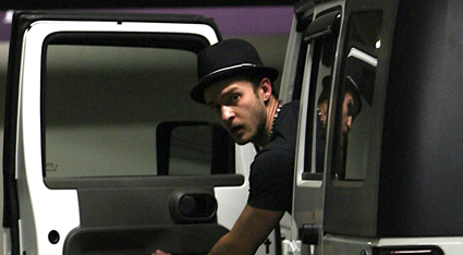 Justin Timberlake looks out of his White Jeep Wrangler