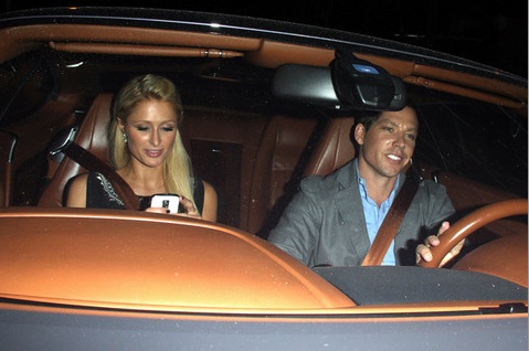 Paris Hilton’s BF Runs Over A Pap In His Bentley