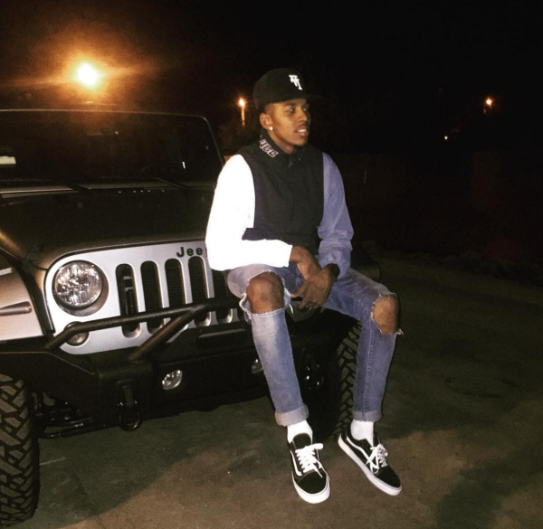 Swaggy P Sitting on his Jeep