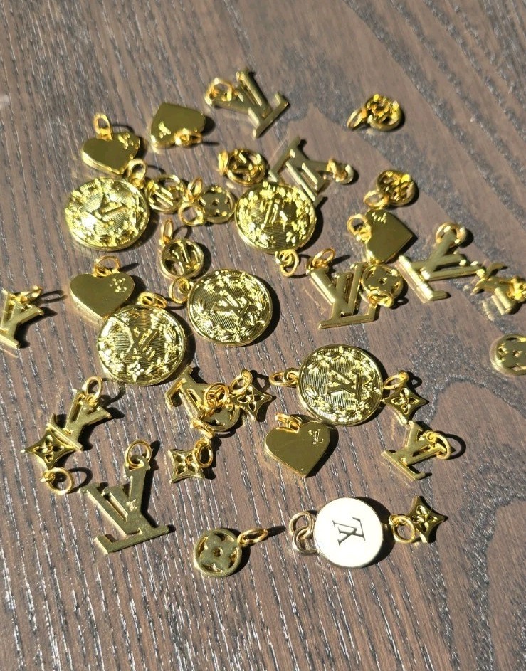 LV Lot of 35 KeychainCharm Gold  Metal 15mm