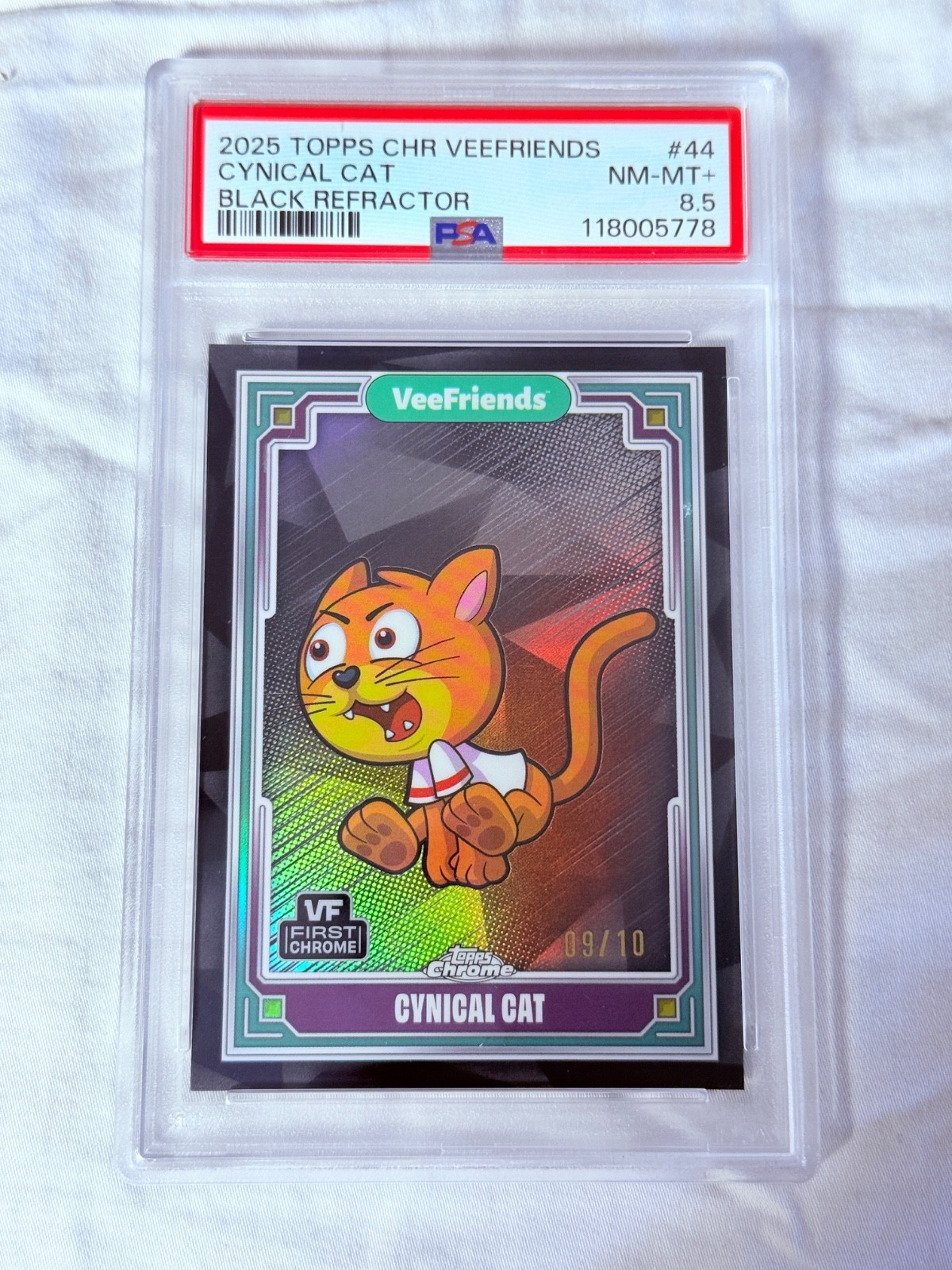 2025 Topps Chrome VeeFriends Black Refractor 1st Chrome Cynical Cat /10 PSA 8.5 2025 Topps Chrome VeeFriends Black Refractor 1st Chrome Cynical Cat /10 PSA 8.5