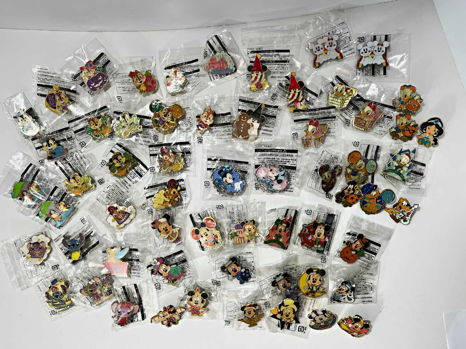 Lot of 60 Tokyo Disney Resort TDR Exclusive Pins Most of them are new Lot of 60 Tokyo Disney Resort TDR Exclusive Pins Most of them are new