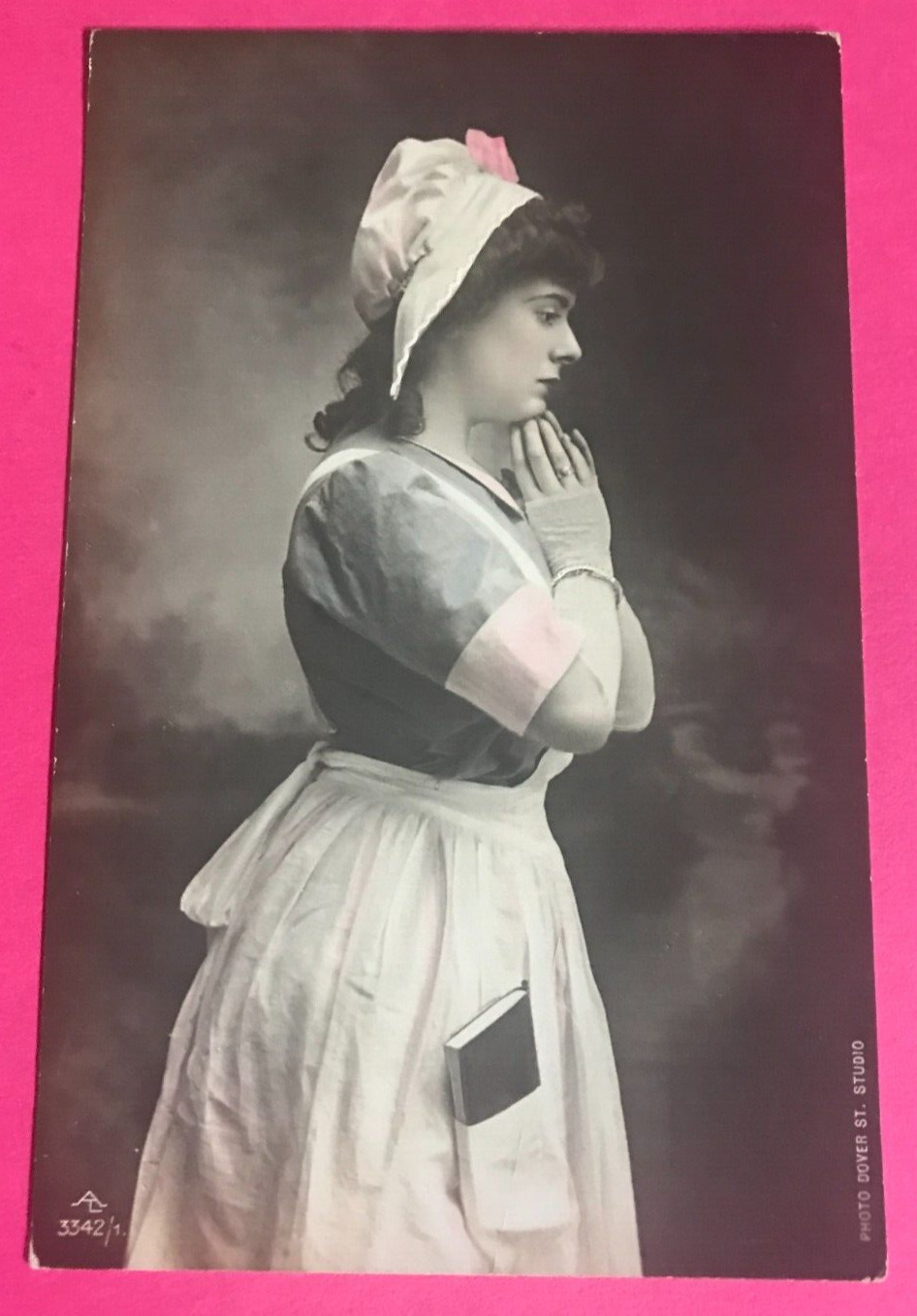 ANTIQUE TINTED REAL PHOTO Postcard   (RPPC)  YOUNG Pensive NURSE, 1910, French