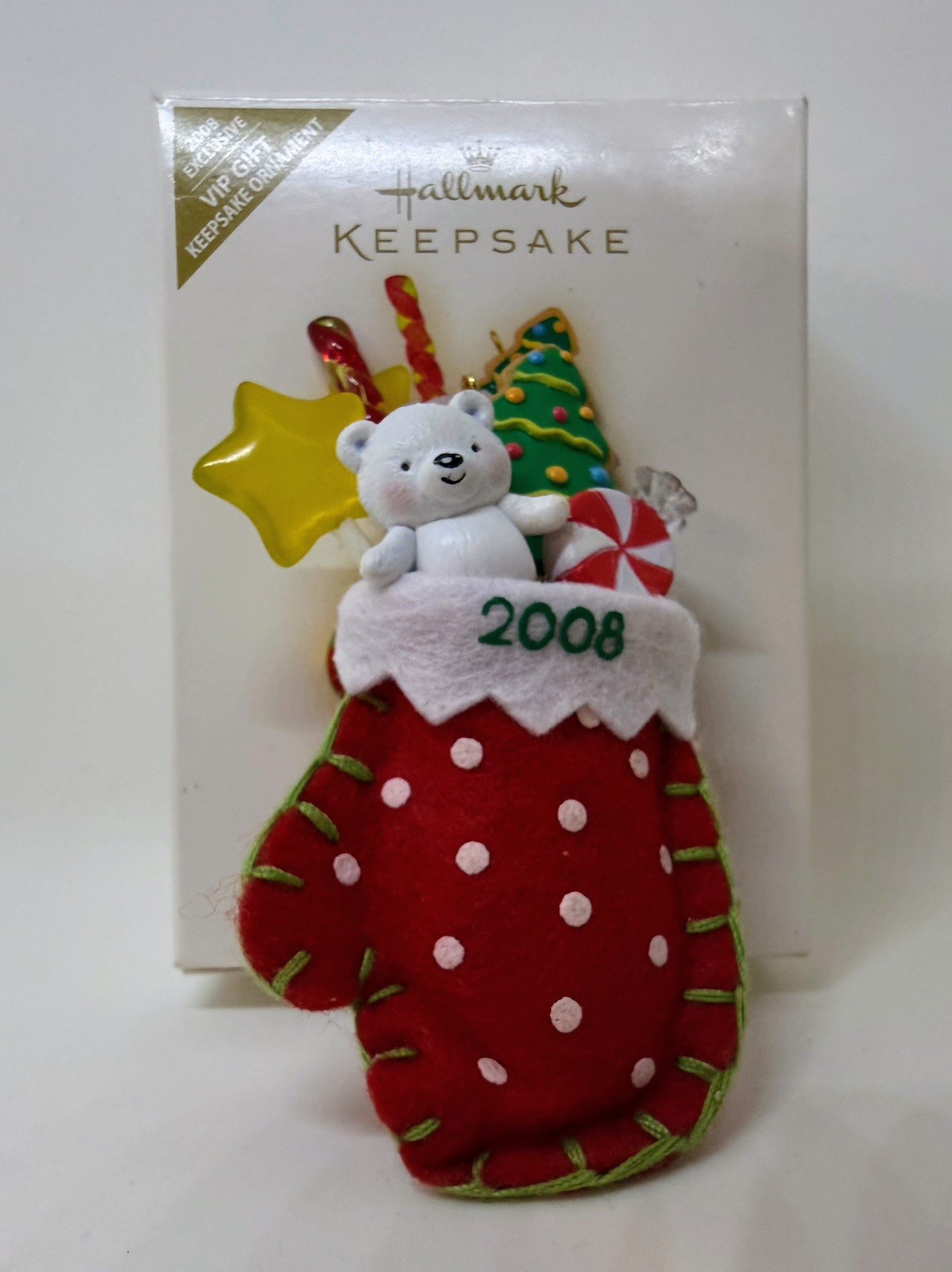Hallmark- “A Christmas Surprise” - VIP Exclusive Mitten Stocking Ornament (1980) Hallmark- “A Christmas Surprise” - VIP Exclusive Mitten Stocking Ornament (1980)