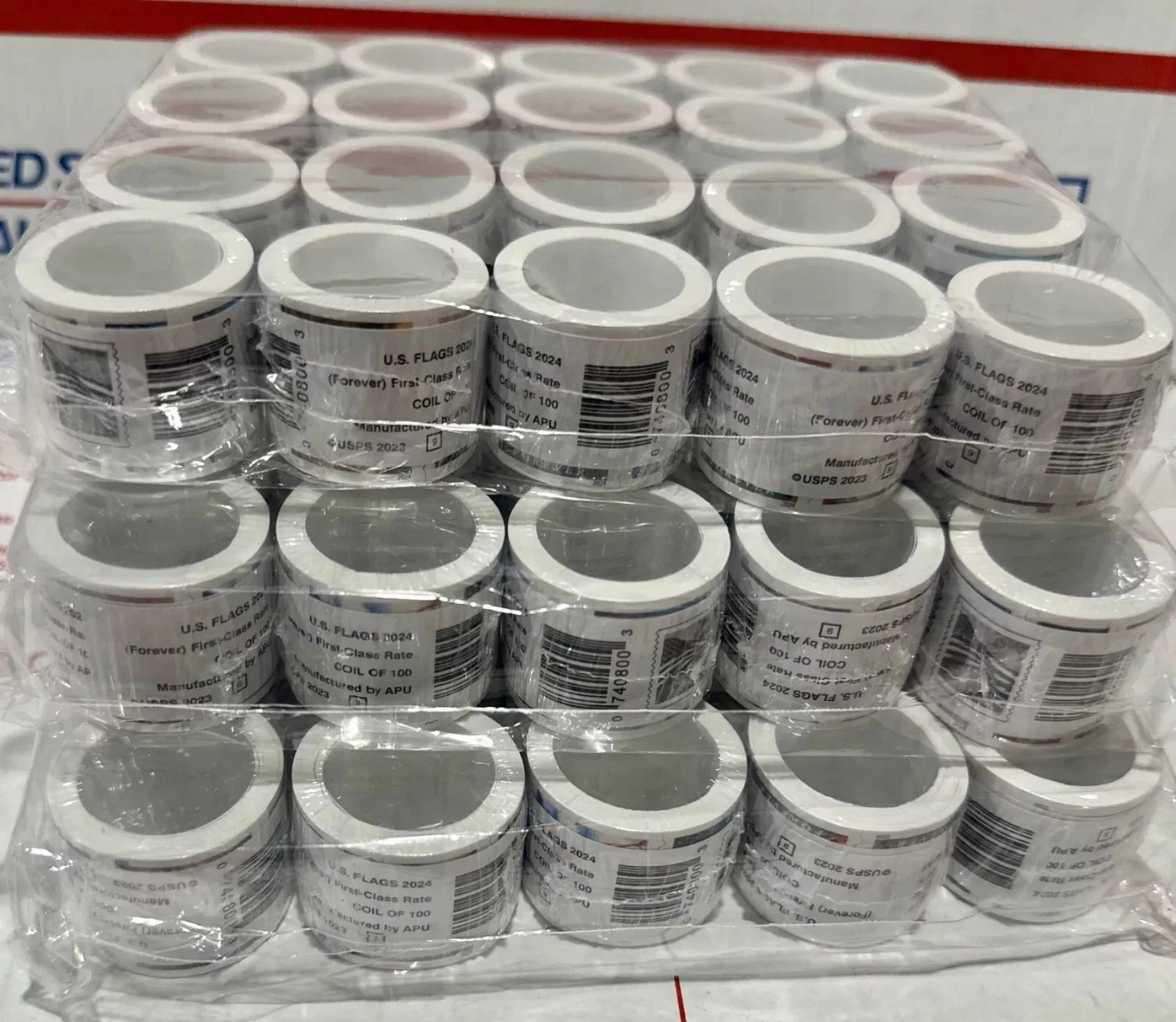 20 rolls of 100 USPS postage stamps, totaling 2000 pieces 20 rolls of 100 USPS postage stamps, totaling 2000 pieces