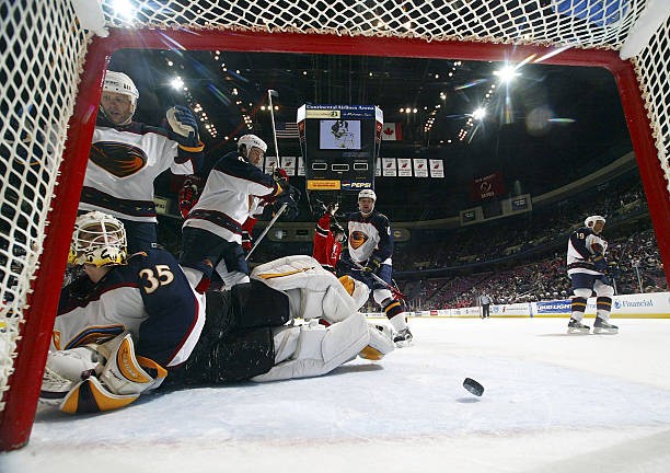 Michael Garnett Atlanta Thrashers watches the puck skip out - Ice Hockey Photo Michael Garnett Atlanta Thrashers watches the puck skip out - Ice Hockey Photo