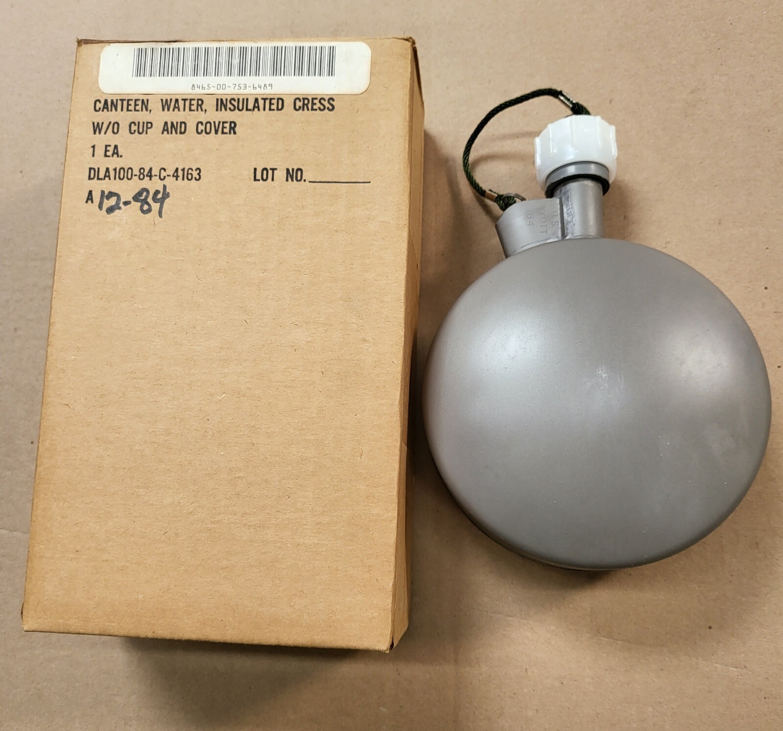 US MILITARY, CANTEEN, WATER, INSULATED CRESS, OLD STOCK, NEVER BEEN USED. US MILITARY, CANTEEN, WATER, INSULATED CRESS, OLD STOCK, NEVER BEEN USED.