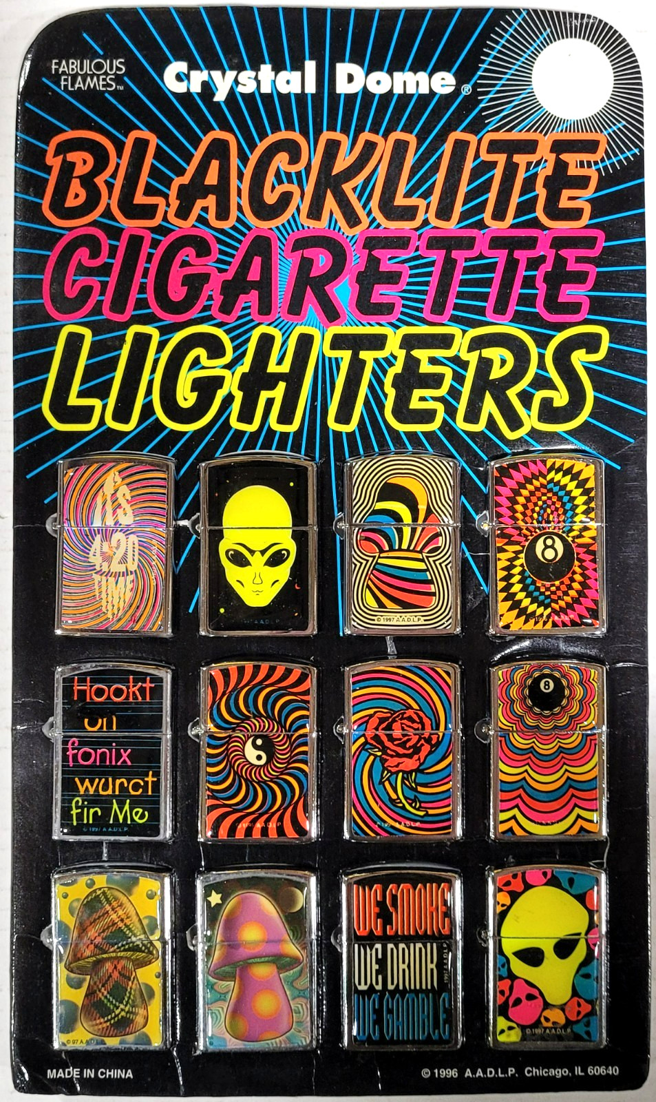 Vintage 1996 - Counter Display of 12 Blacklite Novelty Cigarette Lighters (2102) Vintage 1996 - Counter Display of 12 Blacklite Novelty Cigarette Lighters (2102)