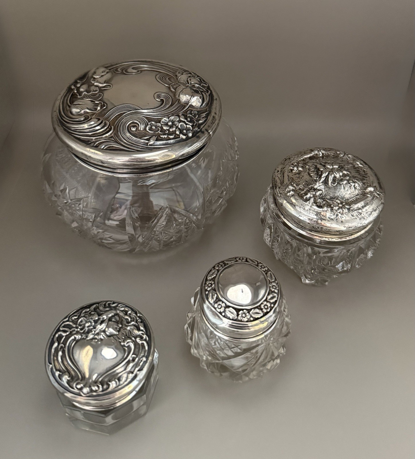 Collection of Four Antique Vanity Jars Sterling Silver Lids. Art Nouveau Design
