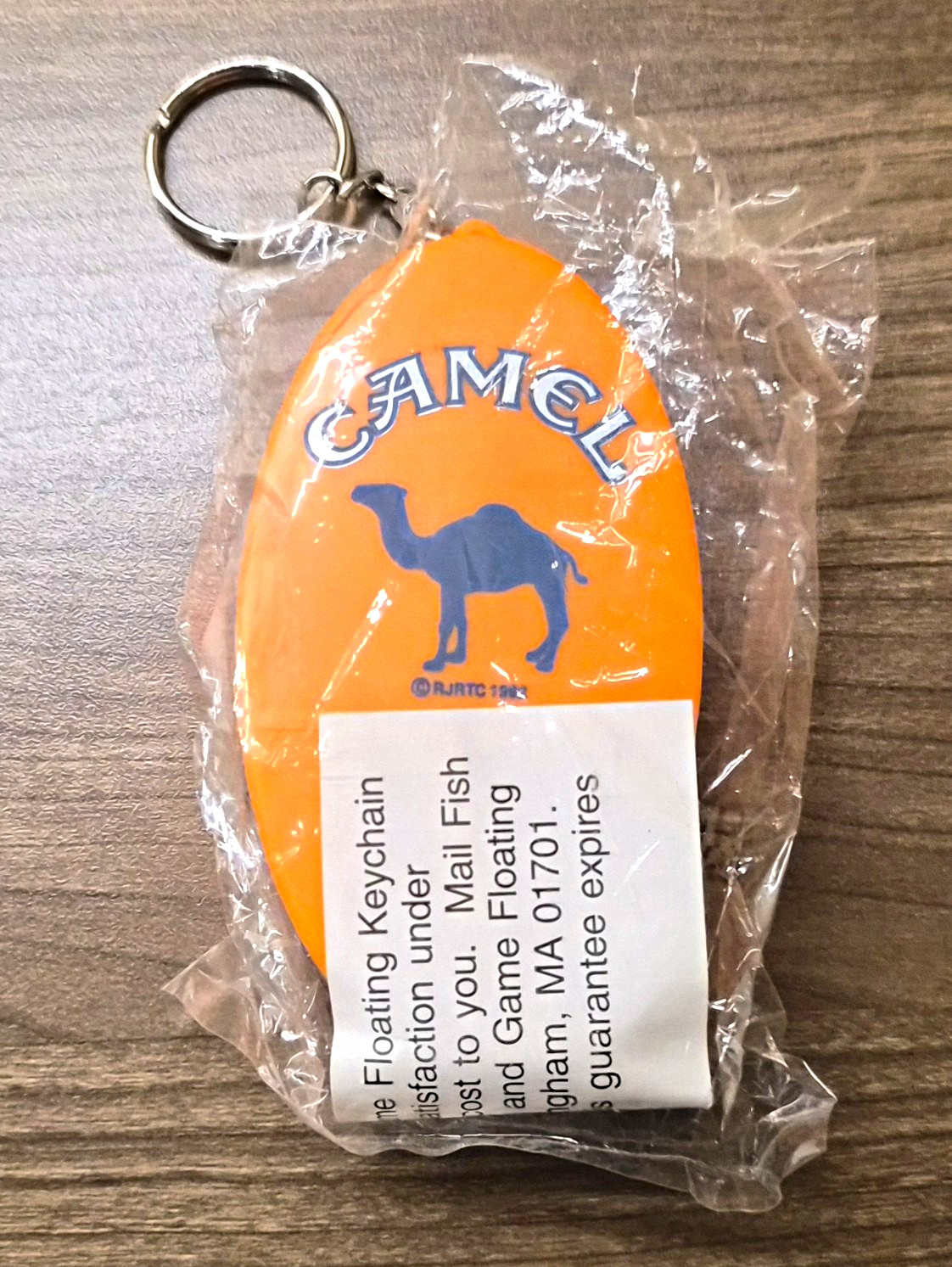 1994 Camel Cigarettes Floating Keychain Lighter Holder NOS Sealed Orange RJRTC 1994 Camel Cigarettes Floating Keychain Lighter Holder NOS Sealed Orange RJRTC